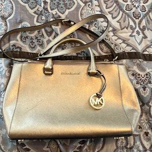 Michael Kors gold metallic leather large tote lightly used great condition.